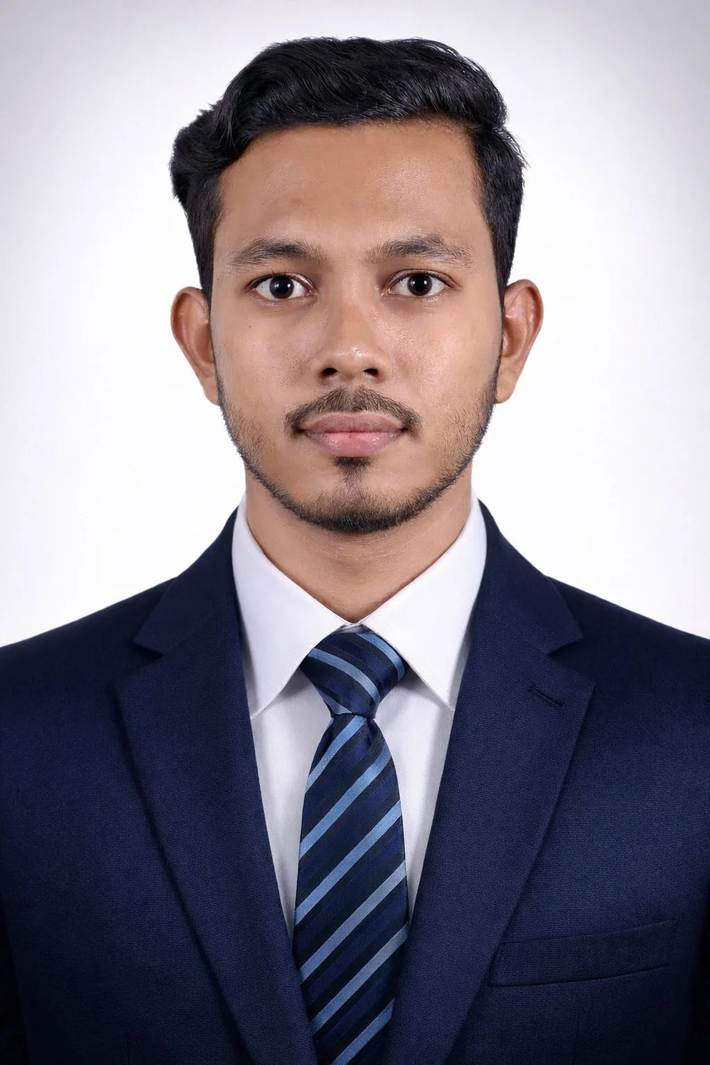 Touhidul Hasan Rifat in a navy suit, formal headshot